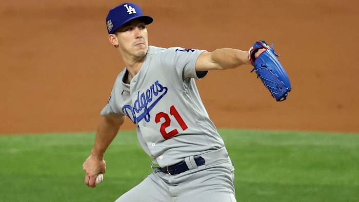 Los Angeles Dodgers starting pitcher Walker Buehler (21) throws against the Tampa Bay Rays during the first inning of game three of the 2020 World Series at Globe Life Field.